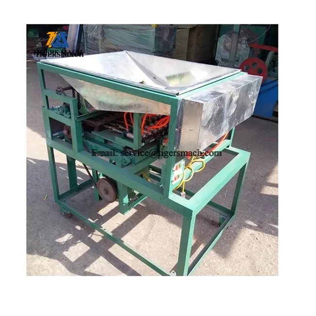 Macadamia opening machine